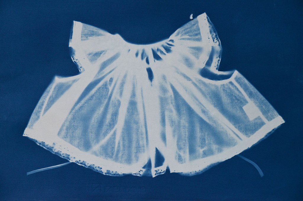 Cyanotype of baby's jacket